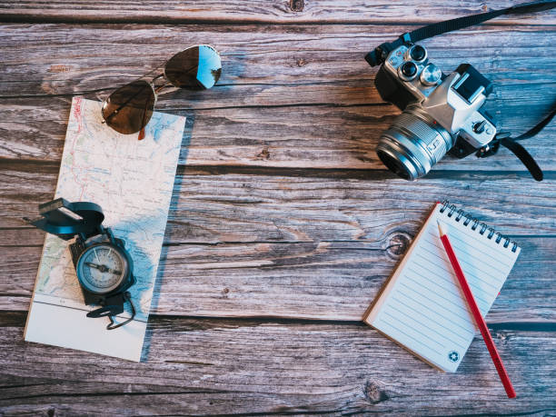istock Travel concept, map, glasses, compass, camera, notebook, pencil, notebook, pencil 1338526405