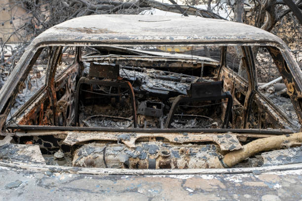 istock Burnt and damaged car 1338536536