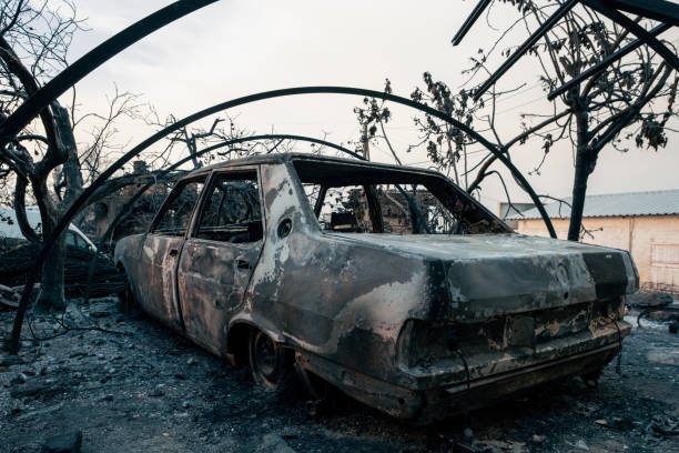 istock Burnt and damaged car 1338537058