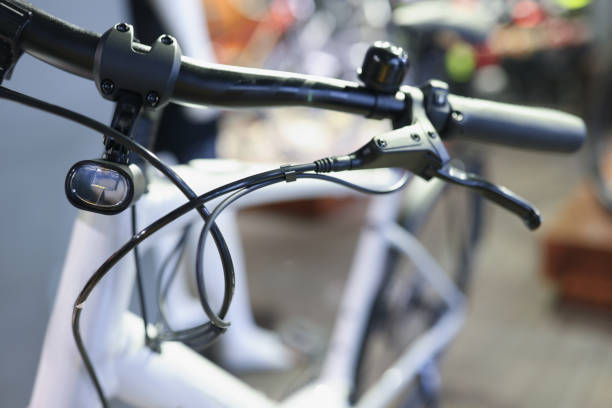 Bicycle handlebars with handbrake and flashlight. Bicycle parts store concept