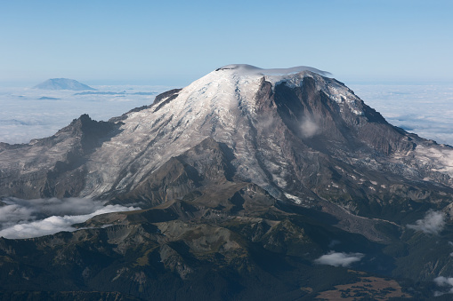 Aerial view of Mount Rainier with Mount Saint Helens in the distance