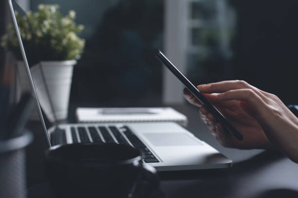 istock Business woman using mobile smart phone 1338547533