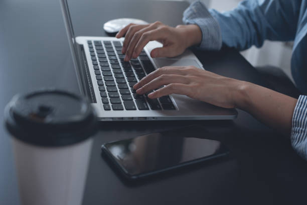 istock Business woman working on laptop computer 1338548110