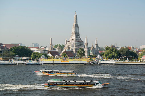 the Wat Arun Temple on the Chao Phraya River in the city of Bangkok in Thailand in Southest Asia.  Thailand, Bangkok, November, 2019