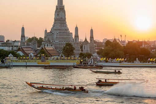 the Wat Arun Temple on the Chao Phraya River in the city of Bangkok in Thailand in Southest Asia.  Thailand, Bangkok, November, 2019