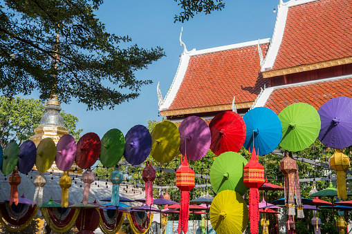 The Wat Pha Khao with thai umbrellas in the city of Chiang Mai at north Thailand.   Thailand, Chiang Mai, November, 2019