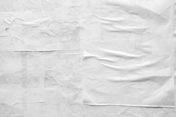 istock Blank white crumpled and creased paper poster texture 1338553439