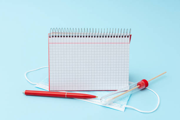 istock Writing Important Medical Notes Laboratory Testing New Virus Medicine Disease Illness Infection Prevention Researching Virus Medicines Scientific Studies Treatment Plans 1338554386