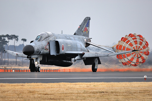 Hillsboro, Oregon, USA - May 22, 2022 : A low fly-by of an Oregon Air National Guard USAF F-15C Eagle. The Air Show in Hillsboro, Oregon is a very popular event each year. The theme for 2022 was “She Flies with her own wings.” All performers, pilots and announcers were women. Hillsboro is a suburb of the city of Portland, Oregon.