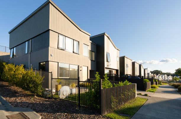 istock Back yard house exterior with well kept garden around. 1338563291