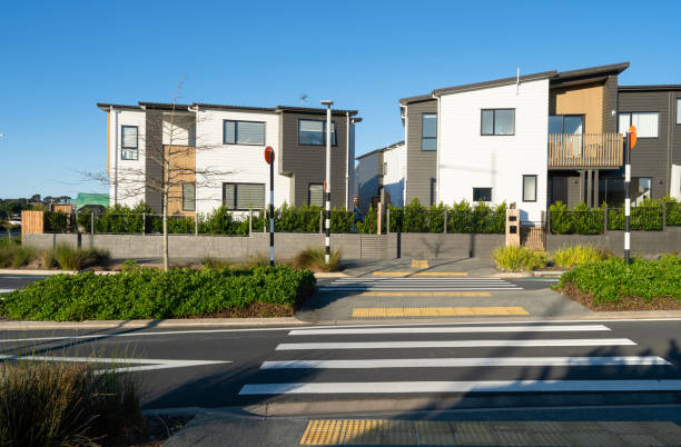 istock Beautiful terraced houses with street front. 1338563804
