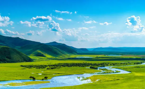 Photo of Plain, grasslands, river and mountain