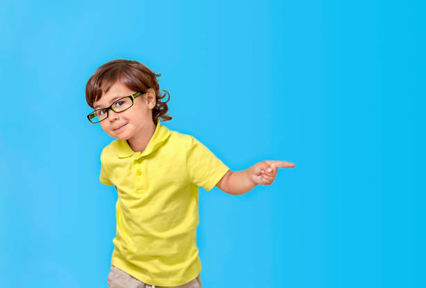 istock Portrait of a boy on a blue background 1338599111