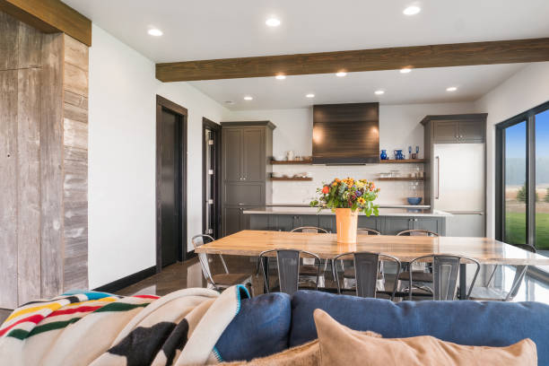 istock Natural wood dining table in modern house 1338599216