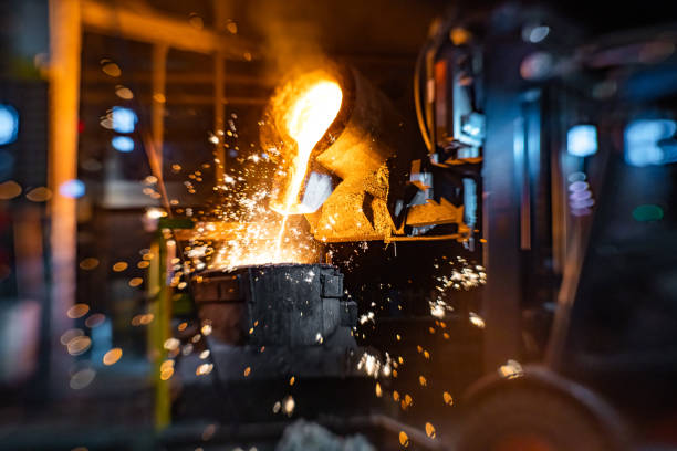 istock Pouring of liquid molten metal to casting mold using forklift 1338613220