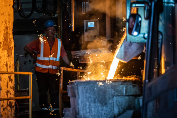Pouring of liquid molten metal to casting mold using forklift