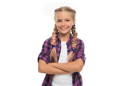 Child little girl colorful braids fashionable hairstyle isolated white. Teenage fashion concept. Fashionable hairstyle. Casual style fashion. Girl confidently crossed arms on chest. Fashion trend.