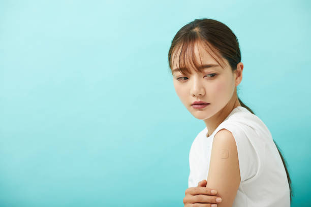 istock A young Asian woman who had been injected. 1338616176