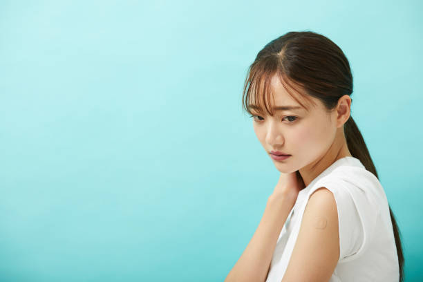 istock A young Asian woman who had been injected. 1338616316