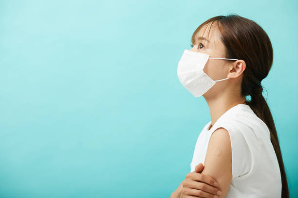 istock A young Asian woman who had been injected. 1338617484