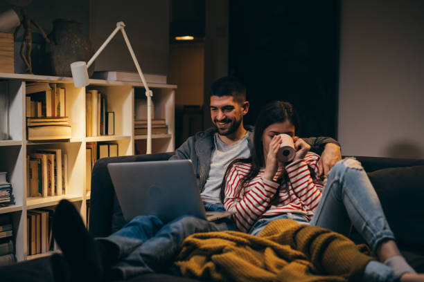 istock young couple spending evening together at home 1338617976