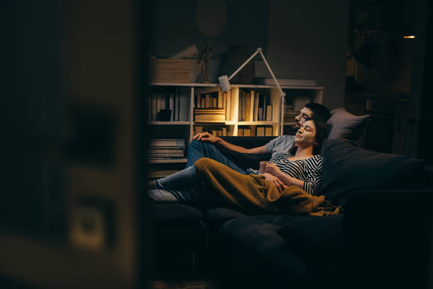 istock young couple spending evening together at home 1338617978