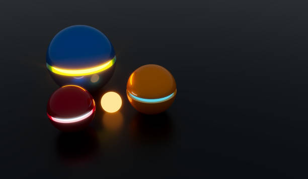 istock Glowing 3D spheres of different colors lying on a reflective floor. 3d background. 3d rendering 1338618135