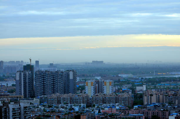istock City background in sunset 1338622703