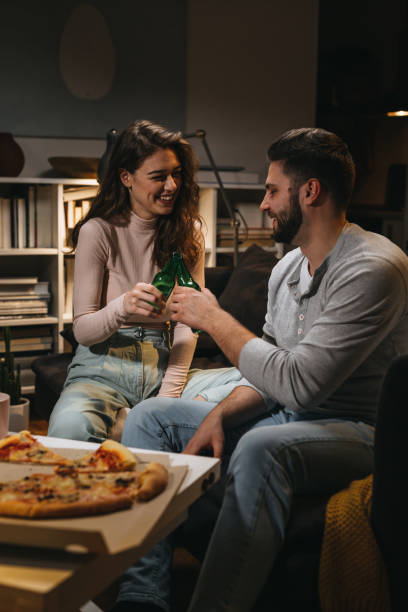 istock young couple spending evening at home 1338628633