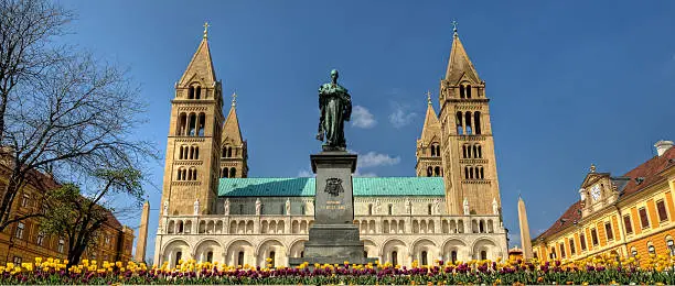 Hungarian chatedral with four tower and flowers in Pécs
