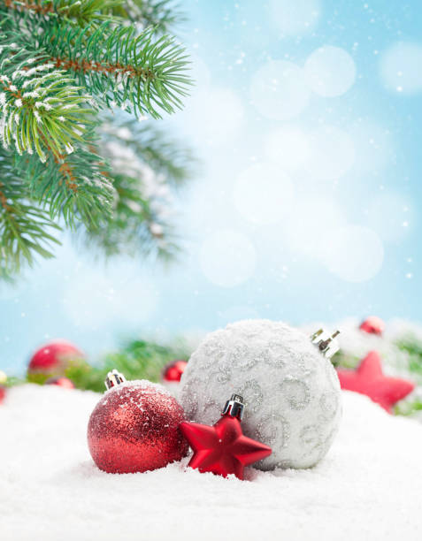 istock Christmas greeting card with decor in snow 1338628754