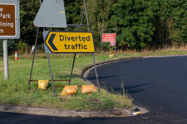 istock Yellow diverted traffic sign post 1338628905