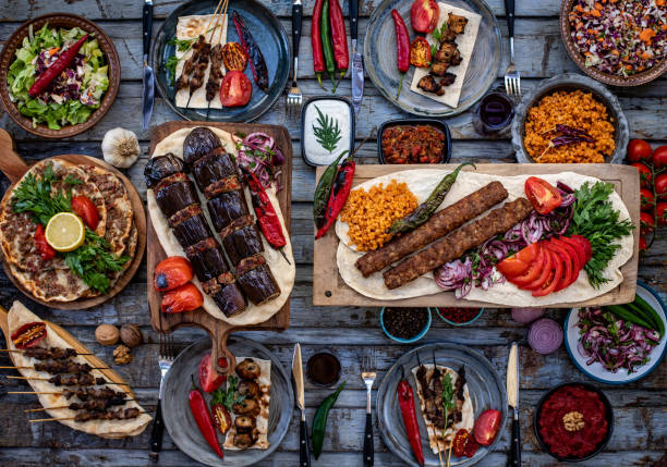 Many types of kebab on the table like adana kebab. Dining table with family and friends. lebanese culture stock pictures, royalty-free photos & images