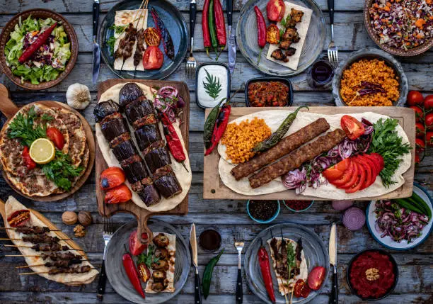 Photo of Many types of kebab on the table like adana kebab.