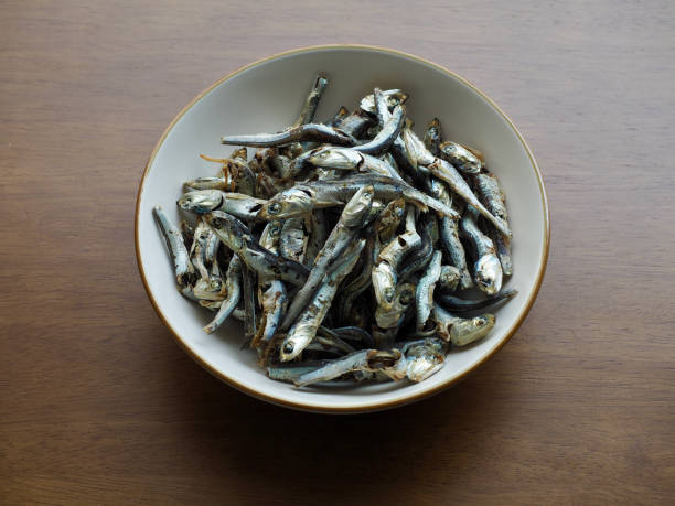 istock Dried anchovy background, food ingredient 1338630968