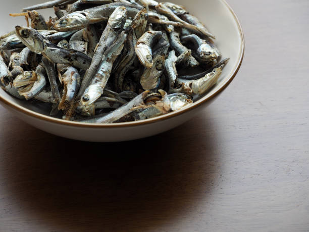 istock Dried anchovy background, food ingredient 1338630987