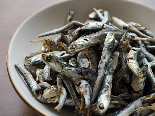 istock Dried anchovy background, food ingredient 1338630988