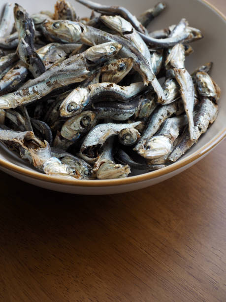 istock Dried anchovy background, food ingredient 1338630997