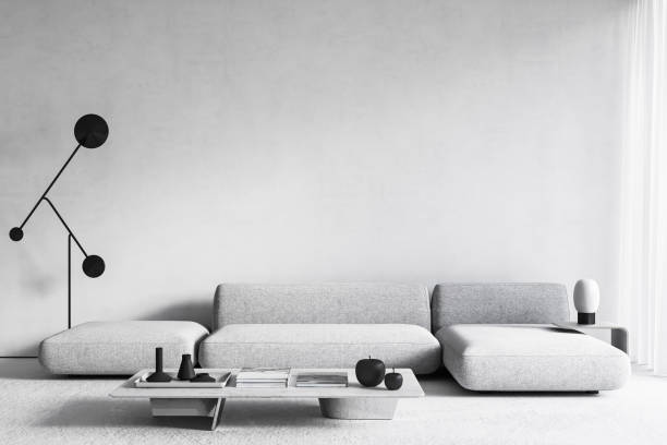istock White modern minimalist interior with sofa, coffee table and floor lamp. 3d render illustration mockup. 1338633671