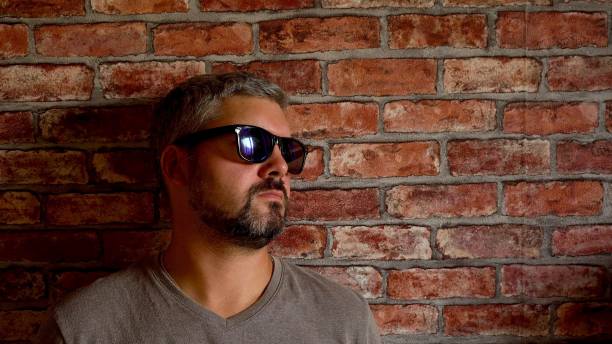 istock A man with glasses sighs 1338635882