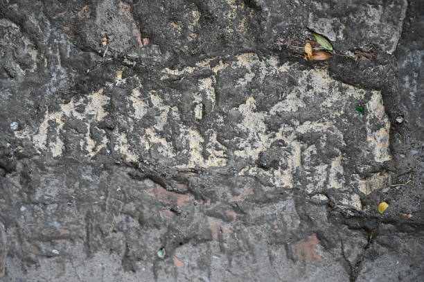 istock Old dirty wall close up. Grunge abstract photo background.  Beautiful stone texture pattern. 1338640164