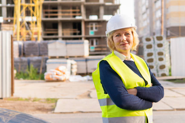 istock A woman Builder at a construction site inspects a building 1338641728