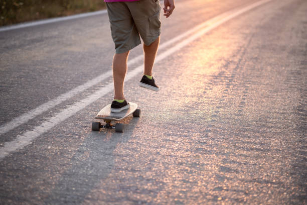 istock Unrecognizable Caucasian man skating on an open road 1338642261