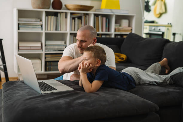 istock father and son at home 1338643247