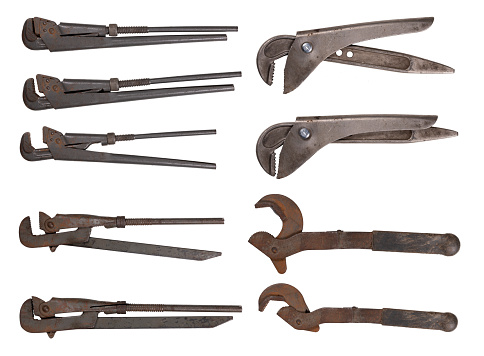 Adjustable wrenches for hydraulic work. Household repair tools. Isolated background.