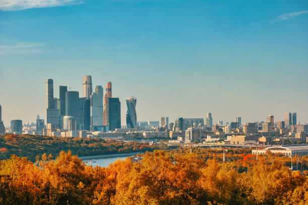 Moscow Russia, city skyline of Moscow business center view from Sparrow Hill with autumn foliage season Moscow Russia, city skyline of Moscow business center view from Sparrow Hill with autumn foliage season moscow russia stock pictures, royalty-free photos & images