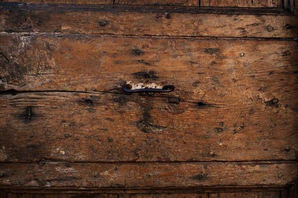 istock Weathered brown wood planks 1338651938