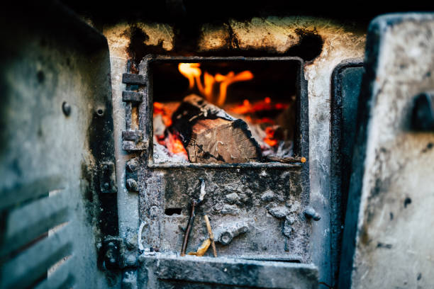 Antique wood cook stove on white background