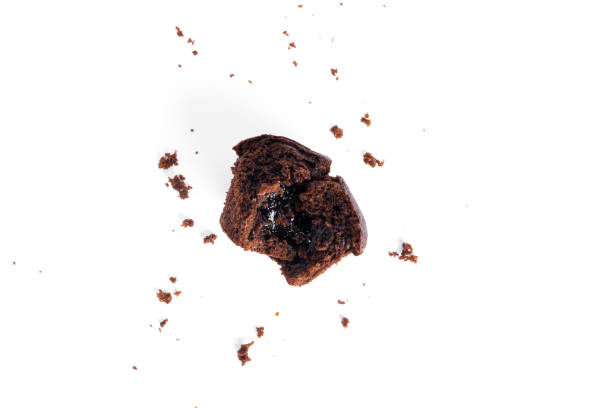 istock Chocolate cupcakes with cherry jam isolated on a white background. Chocolate muffin 1338657840