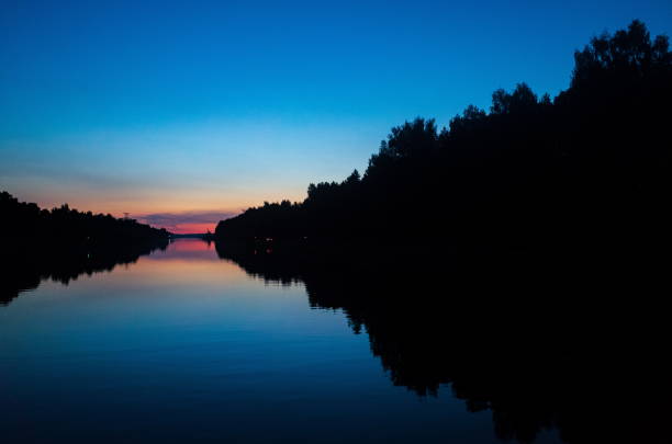 istock Beautiful evening sky on the river 1338659883
